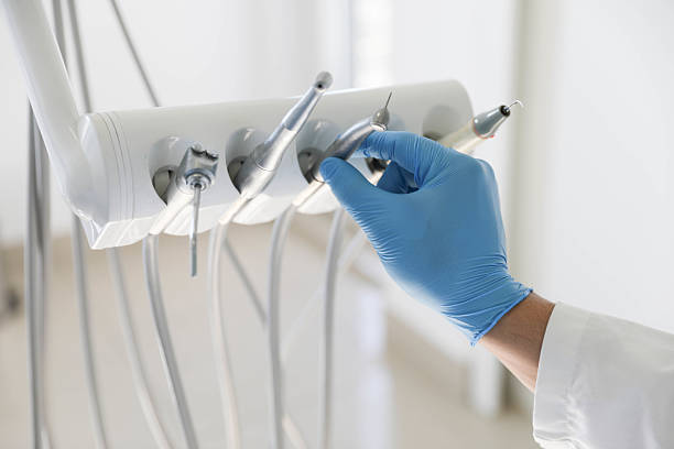 Professional Emergency Dentist technician working in Henryetta, OK
